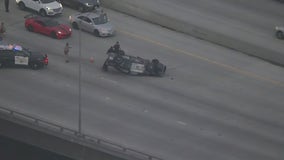 Cop car flips over following pursuit in Long Beach