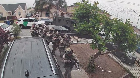 Man arrested after dramatic raid at Huntington Park home with mother and children inside