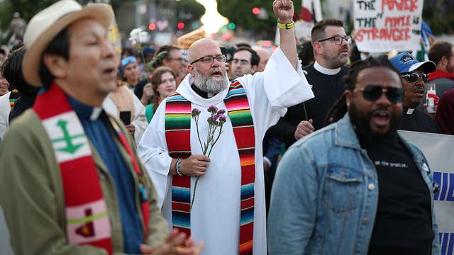 'A united Church': LA faith leaders from different denominations bring flowers instead of fear