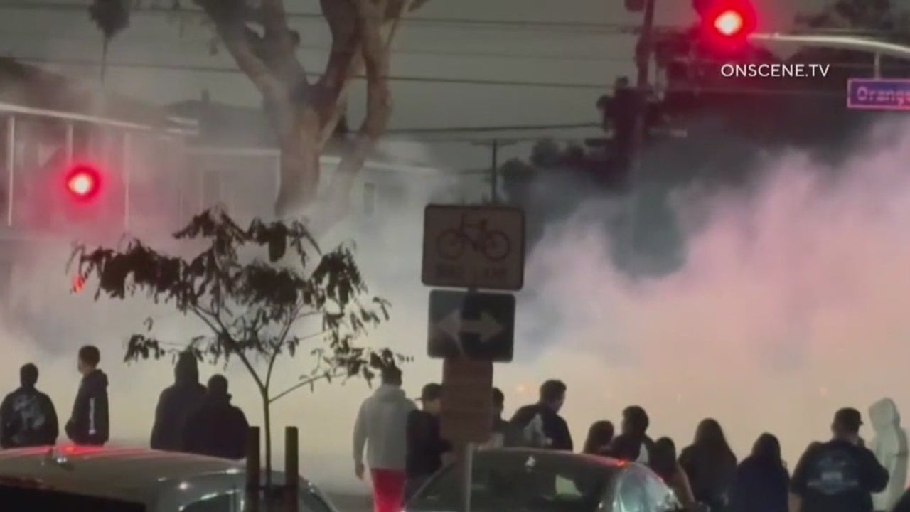 Large crowd captured looting neighborhood market during Long Beach street takeover