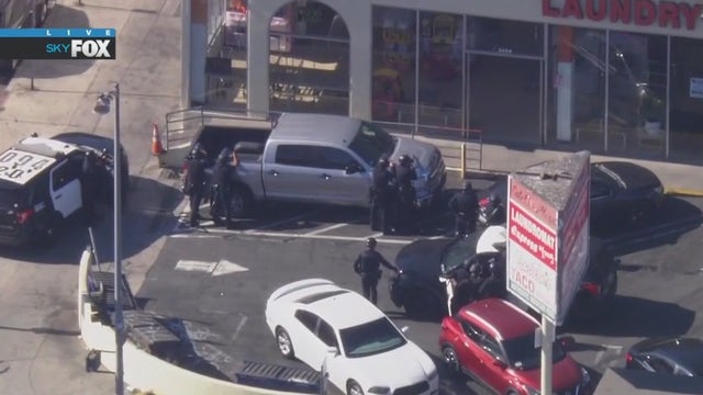 Suspected gunman surrenders after barricading inside Koreatown laundromat