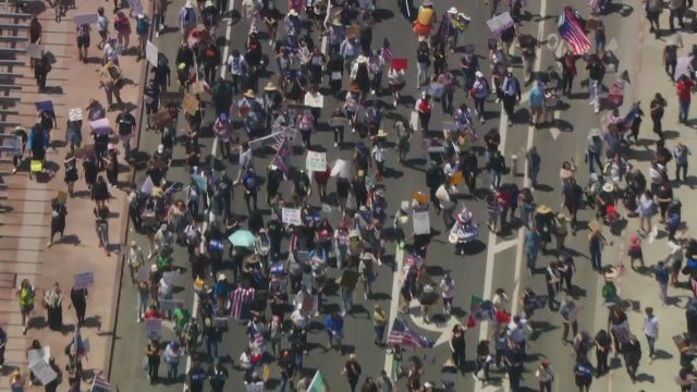 Large group in downtown LA rallies against ICE, federal immigration enforcement