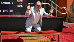 Gary Oldman places handprints, footprints outside TCL Chinese Theatre