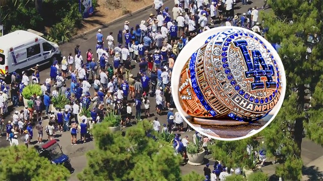 Dodger fans wait in line for hours to receive Shohei Ohtani's replica World Series ring