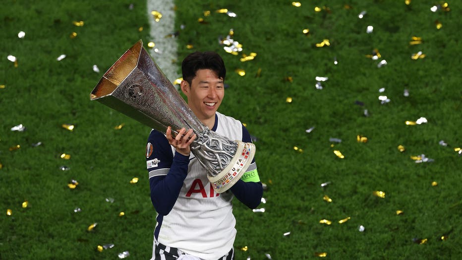 Son Heung-Min of Tottenham Hotspur lifts the UEFA Europa League trophy after his team's victory in the UEFA Europa League Final 2025 between Tottenham Hotspur and Manchester United at Estadio de San Mames on May 21, 2025 in Bilbao, Spain. (Photo by Carl Recine/Getty Images)