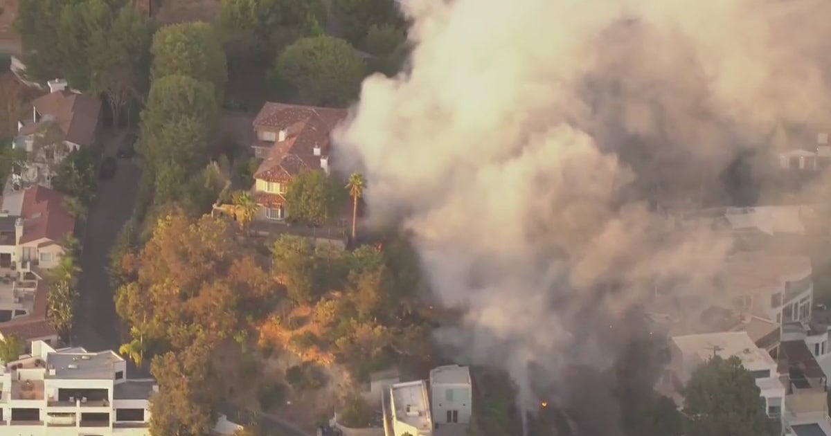Hollywood Hills car fire sparks small brusher | FOX 11 Los Angeles