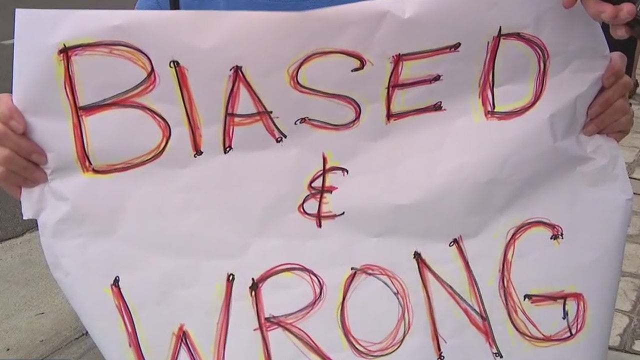 Protesters greet Supreme Court Justice Amy Coney Barrett in Yorba Linda