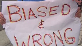 Protesters greet Supreme Court Justice Amy Coney Barrett in Yorba Linda