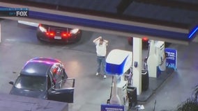 Suspect in custody after chase ends at Norwalk gas station