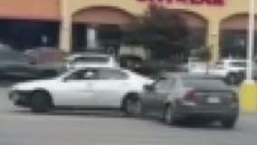 2 cars chase each other in apparent road rage at shopping center in West Covina