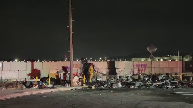 Gunfire, suspected arson at Sun Valley homeless encapment leads to dramatic dog rescue