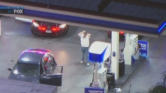 Suspect in custody after chase ends at Norwalk gas station
