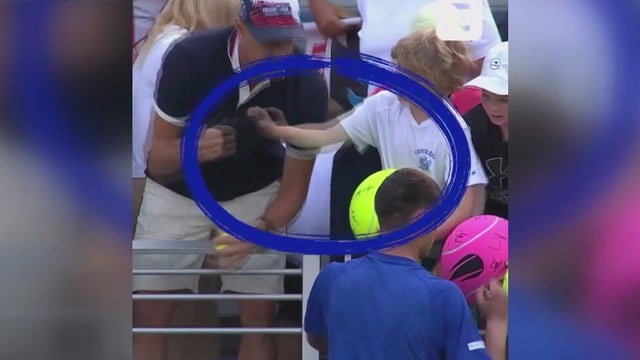 Polish millionaire Piotr Szczerek who snatched signed hat away from child at US Open apologizes