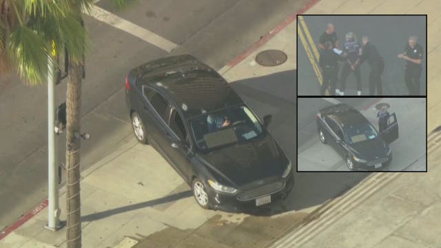 Man surrenders after barricading in car near LA City Hall
