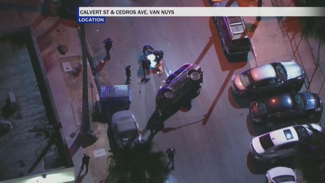 Police chase ends after vehicle flips over in Van Nuys