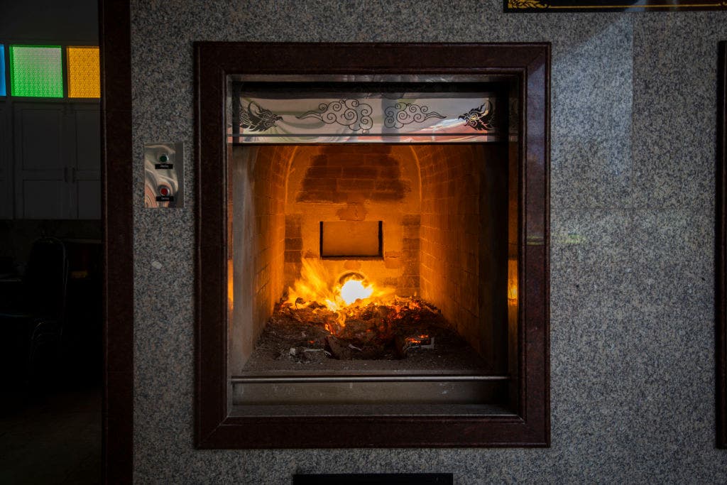 Thai woman brought in for cremation found alive in coffin after knocking