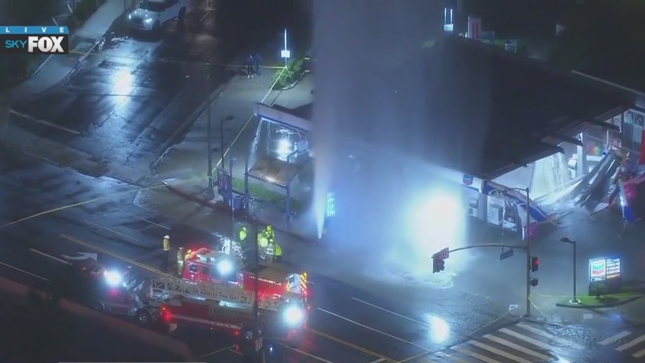 Tarzana gas station awning collapses after fire hydrant sheared during hit-and-run crash