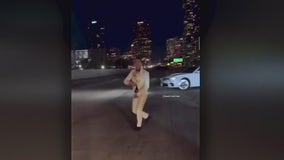 Man charged with stopping traffic on LA freeway to film music video