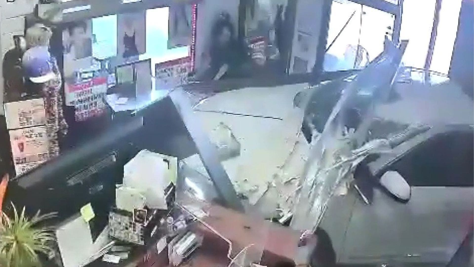 Car smashes into Orange County building