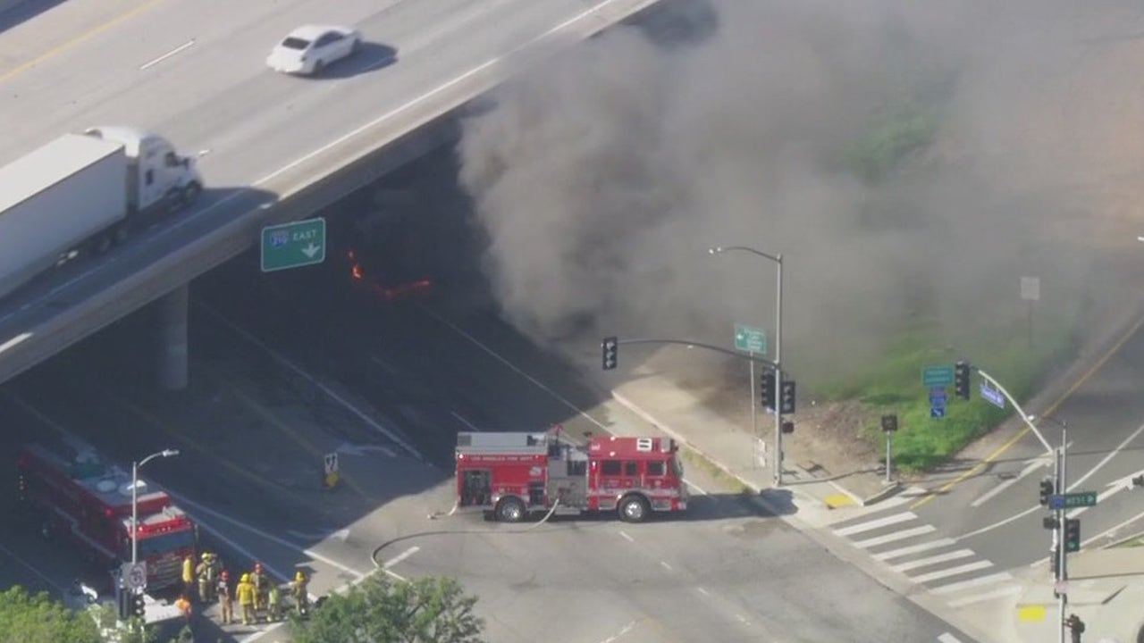 Driver hospitalized after LAUSD bus catches fire under 210 Freeway