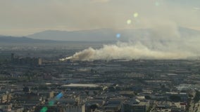 Firefighter injured after massive Boyle Heights fire sends large plume of smoke across LA