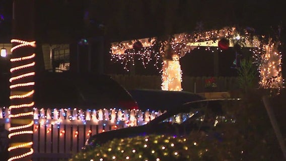 Altadena’s historic Christmas Tree Lane glows on after Eaton Fire