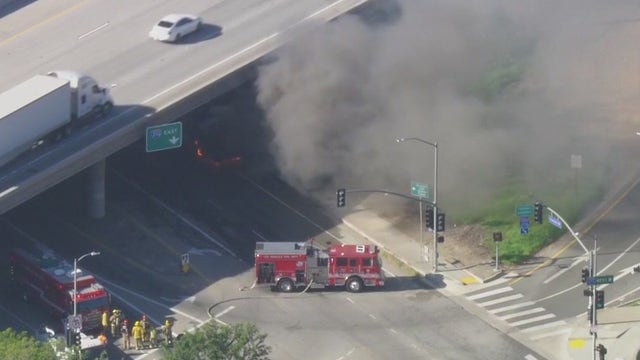 Driver hospitalized after LAUSD bus catches fire under 210 Freeway