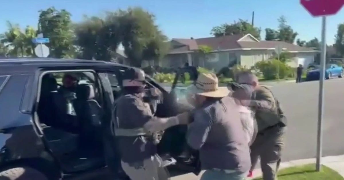Downey residents confront border patrol agents