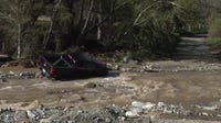 Driver swept away crossing flooded road in Cajon Pass