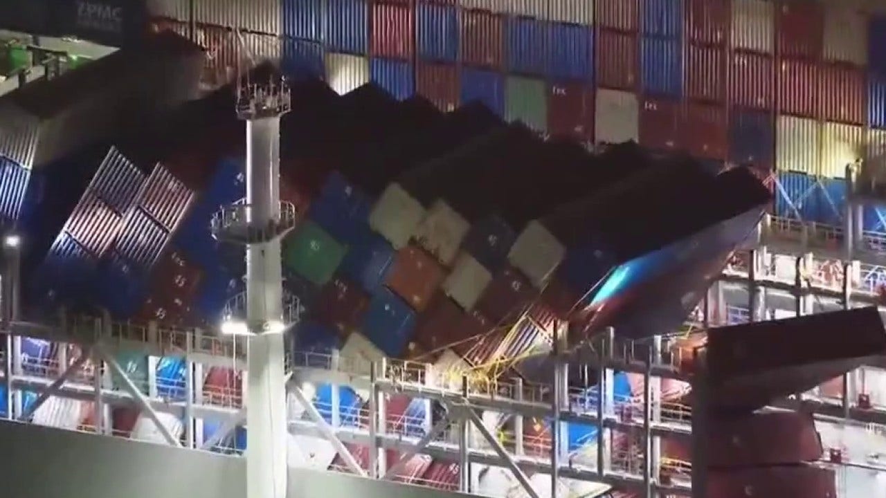Cargo ship at Port of Long Beach under watch after containers damaged in rough seas