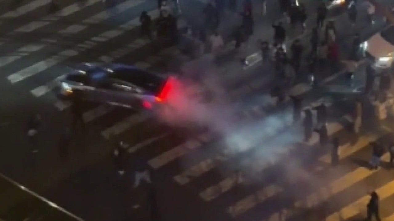 VIDEO: Street takeover escalates to break-in, stabbing at DTLA luxury high-rise