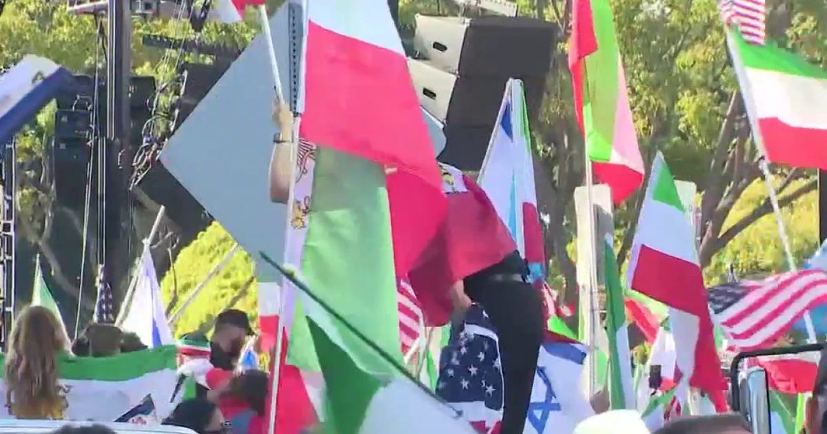 Iran conflict sparks rallies, tighter security and flight cancellations in Los Angeles