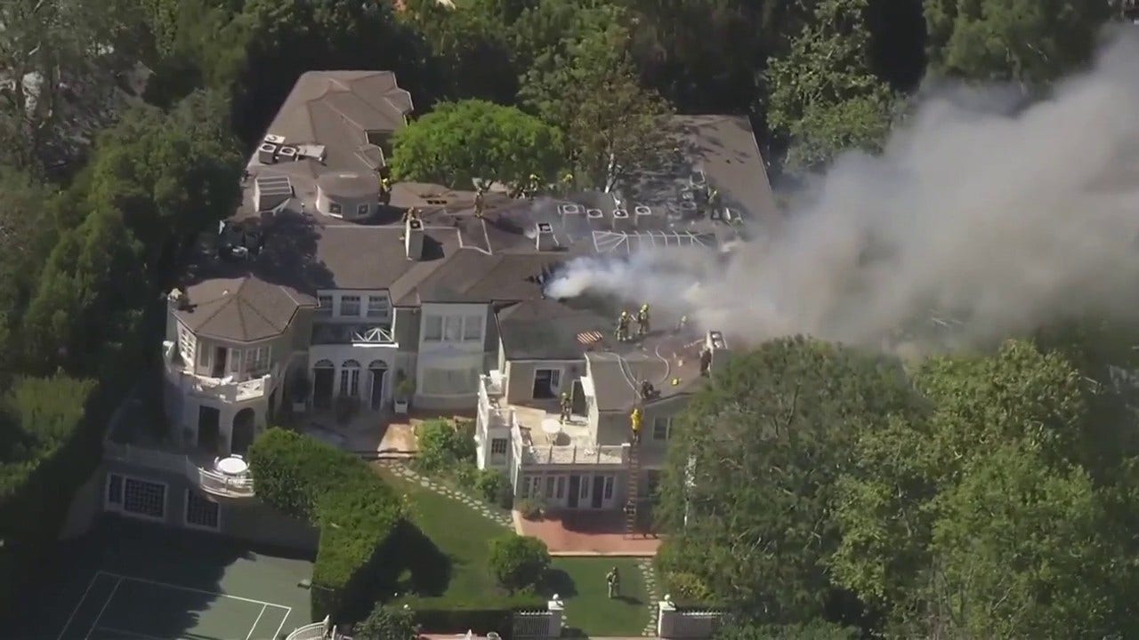 LIVE: 100 firefighters battling Beverly Crest house fire