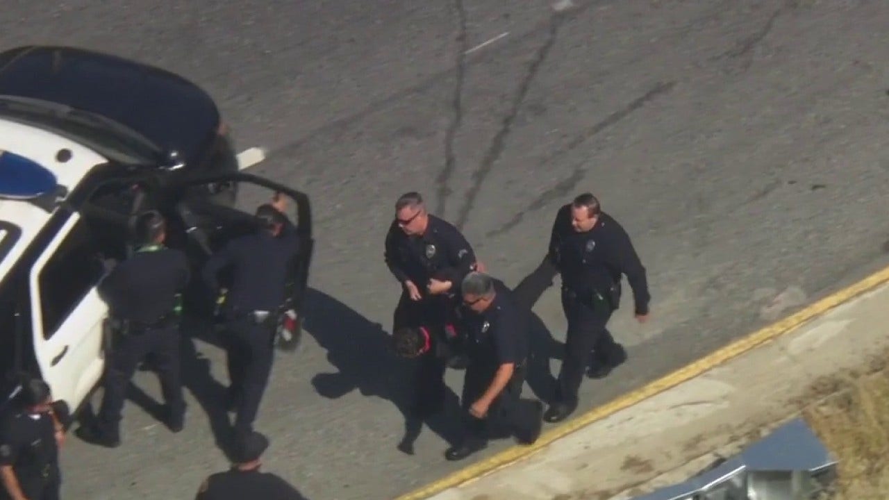 LIVE: Suspect taken into custody after shots fired at end of police chase in East LA