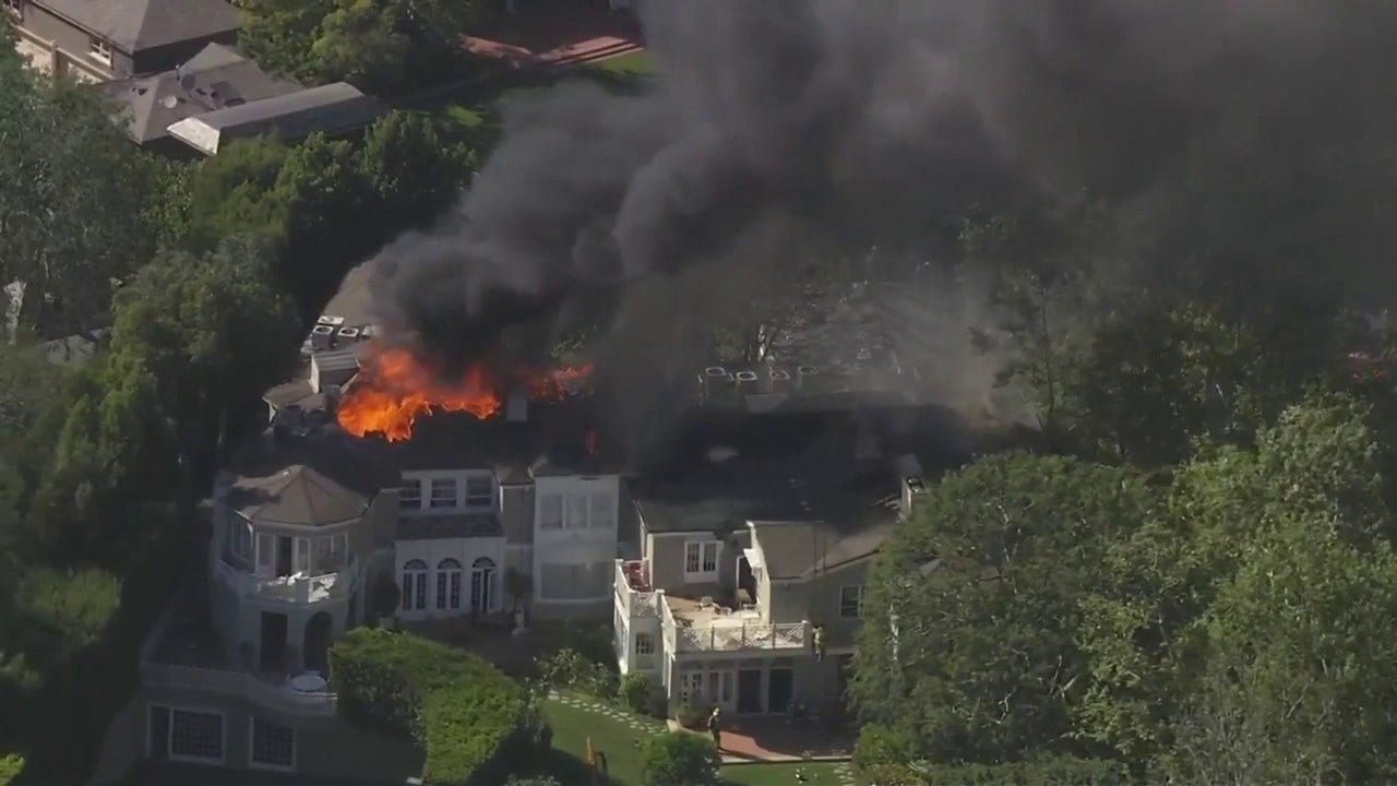 LIVE: 150 firefighters battling stubborn Beverly Crest house fire