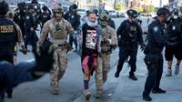 Estimated 6 people arrested in downtown LA after sex toys thrown at police during anti-ICE protest