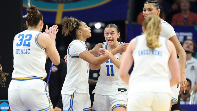 Gabriela Jaquez #11, Kiki Rice #1, Lauren Betts #51, Angela Dugalić #32, and Gianna Kneepkens #8 of the UCLA Bruins react during the first quarter against the South Carolina Gamecocks in the National Championship of the NCAA Women's Basketball Tournament at Mortgage Matchup Center on April 05, 2026 in Phoenix, Arizona. (Photo by Christian Petersen/Getty Images)