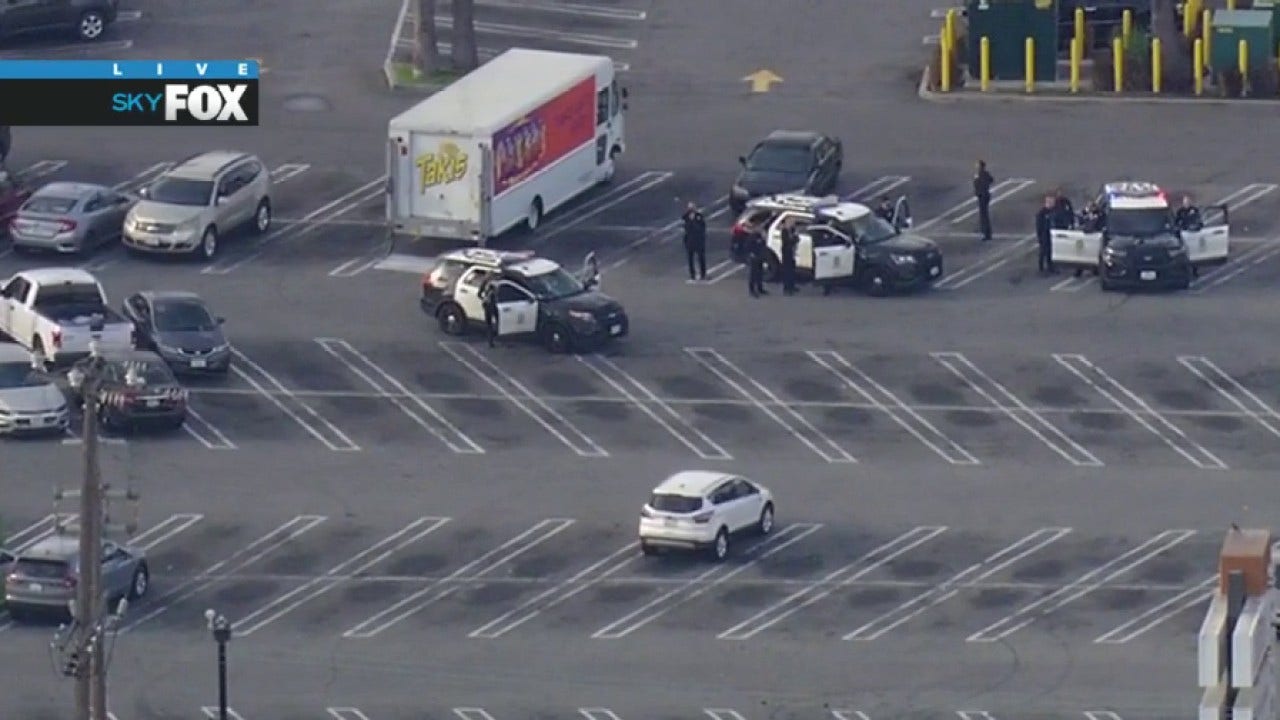 Armed suspect in standoff with LAPD officers in South Los Angeles shopping center
