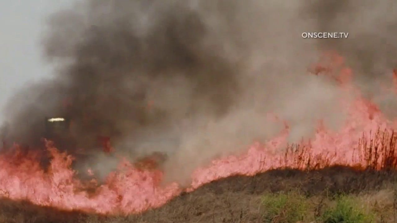 Bain Fire burns more than 1,400 acres in Jurupa Valley; evacuations lifted