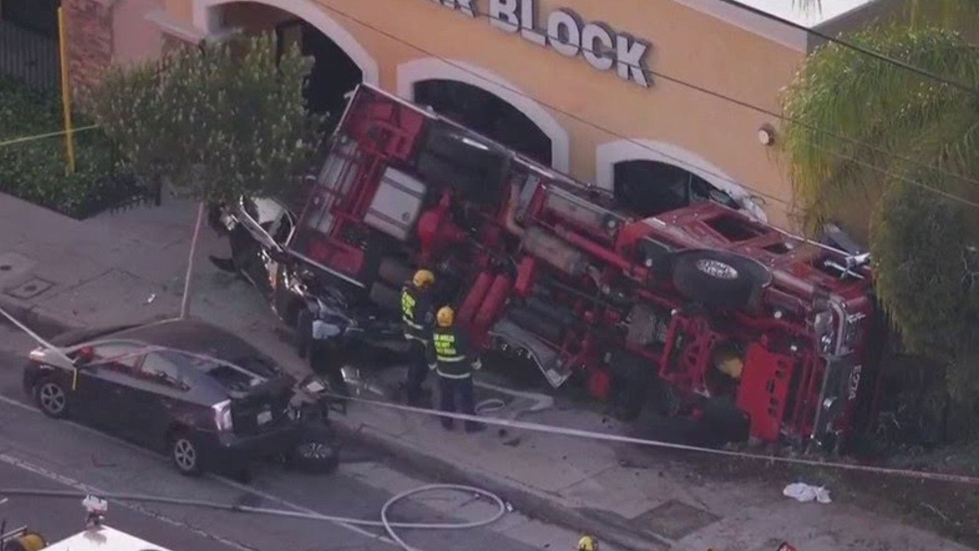 Firetruck flips over in Sunland; 2 crew members hurt