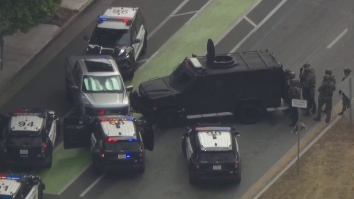 Beverly Hills hostage freed during 9-hour standoff; Armed ride share driver still in pickup truck