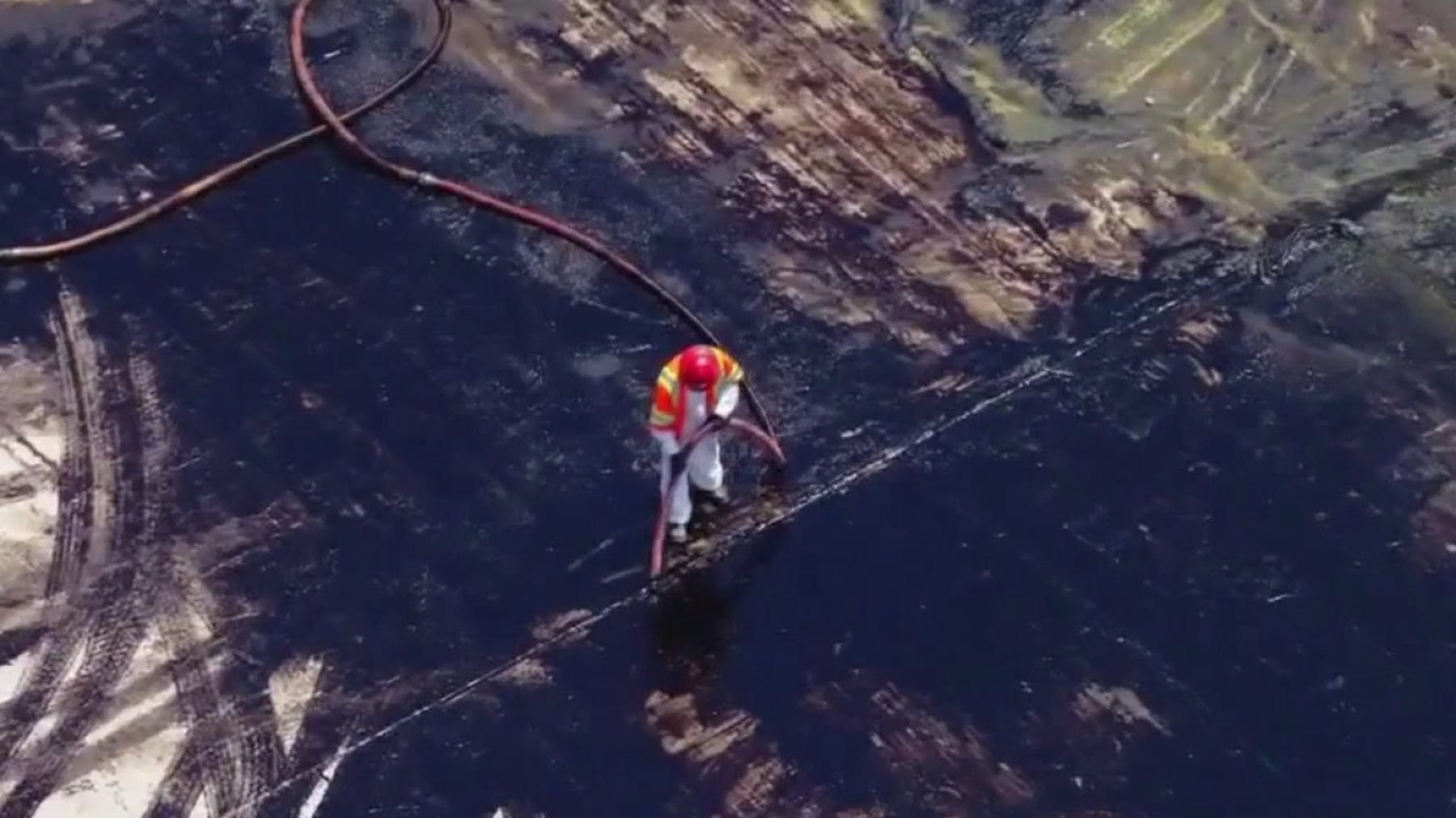 Ruptured underground pipeline dumps about 2,400 gallons of crude oil into LA River