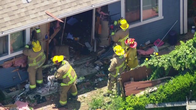 1 hospitalized after car plows into Koreatown home