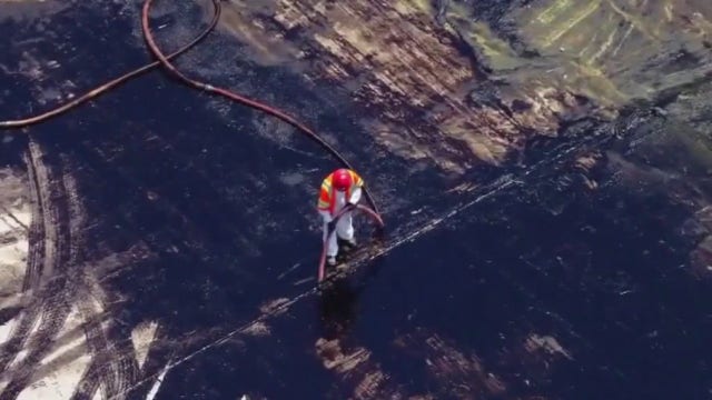 Ruptured underground pipeline dumps about 2,400 gallons of crude oil into LA River