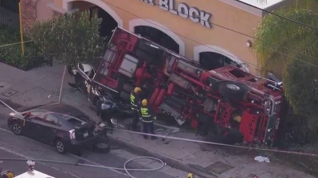 Firetruck flips over in Sunland; 2 crew members hurt