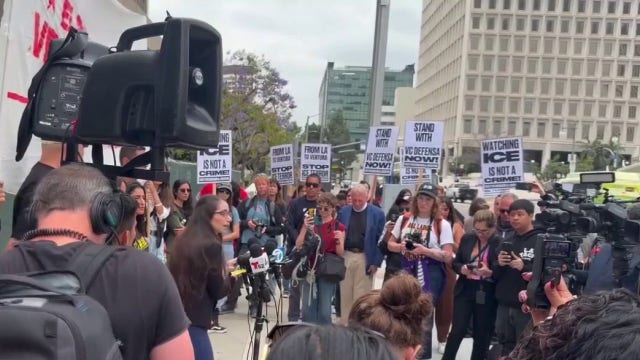 Anti-ICE activists rally in downtown LA after federal search warrants target organizers