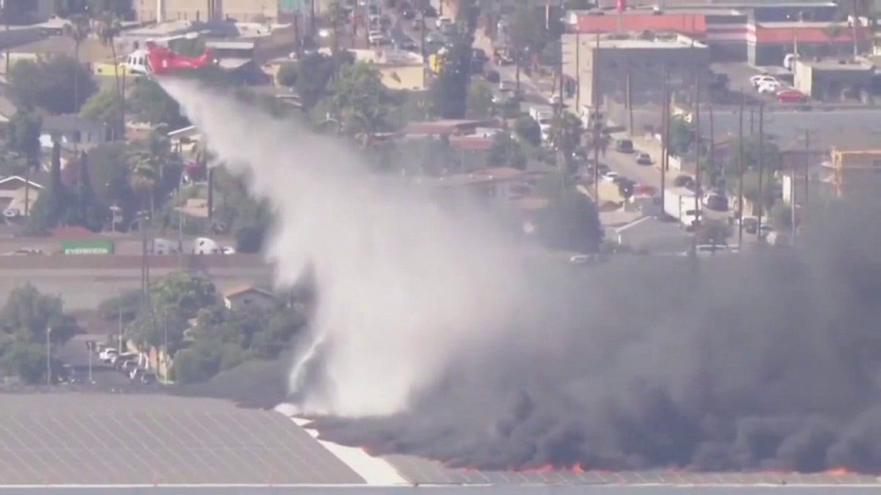 Boyle Heights warehouse fire prompts rare helicopter water drops, extended air quality warning