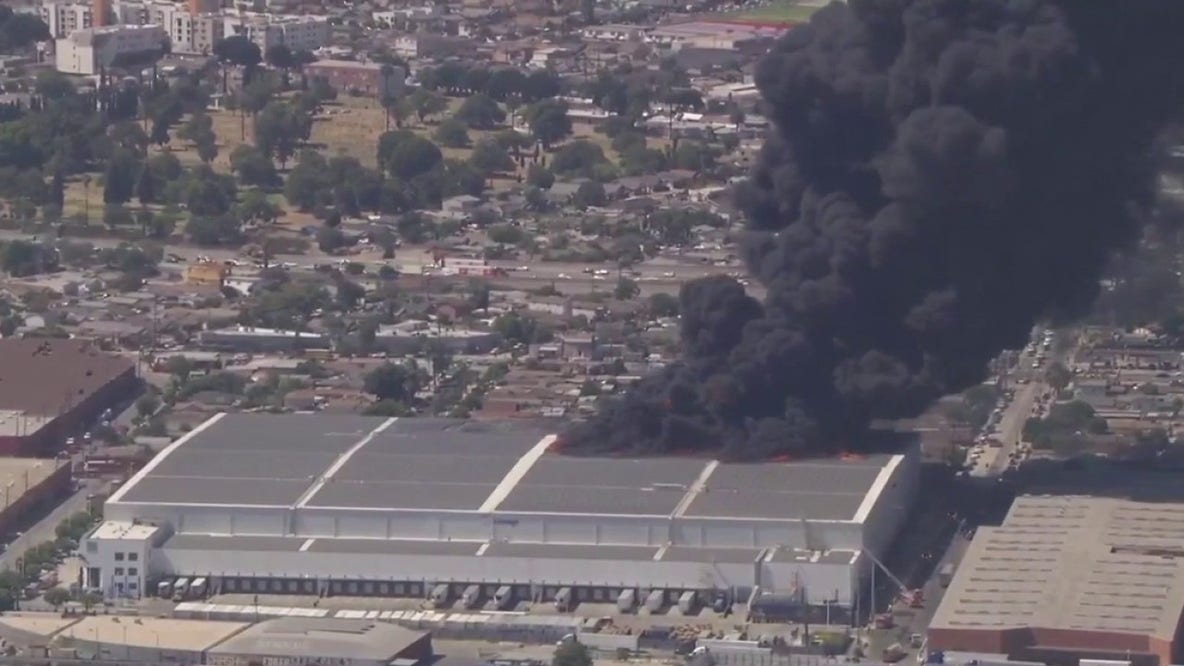 LIVE: Massive fire at a warehouse in Boyle Heights