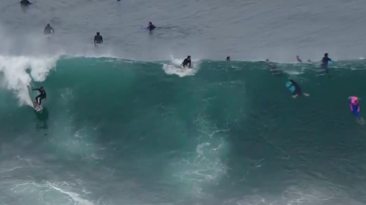 Massive summer swell brings 20-foot waves to Newport Beach's famous Wedge, prompting warnings