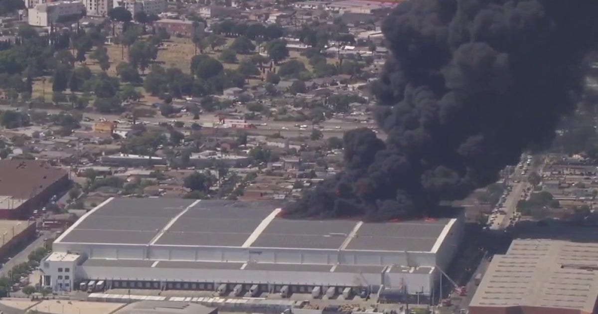 Massive fire at a warehouse in Boyle Heights; Ammonia leak suspected Massive fire at a warehouse in Boyle Heights; Ammonia leak suspected